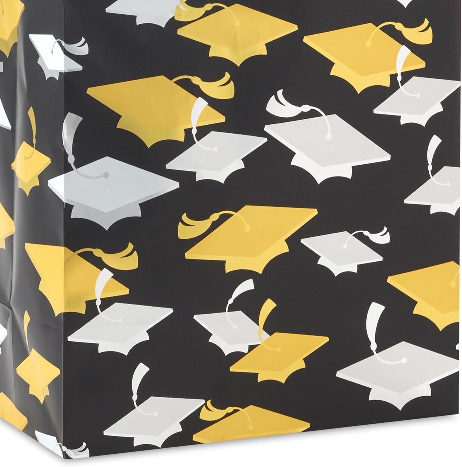 imageHallmark 9quot Medium Graduation Gift Bag with Tissue Paper Gold and Silver Mortarboards on Black for College High School 8th Grade Kindergarten NursesGold and White Mortarboards on Black