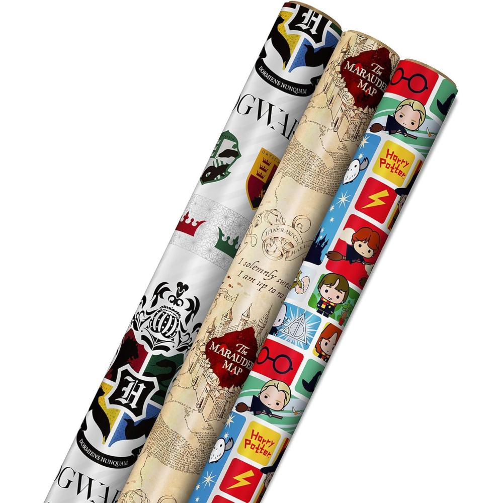 imageHallmark Harry Potter Wrapping Paper with Cut Lines on Reverse 3Pack 60 sq ft ttl Marauders Map Hogwarts Crest for Birthdays Graduations Christmas Valentines Day Kids FansWrapping Paper