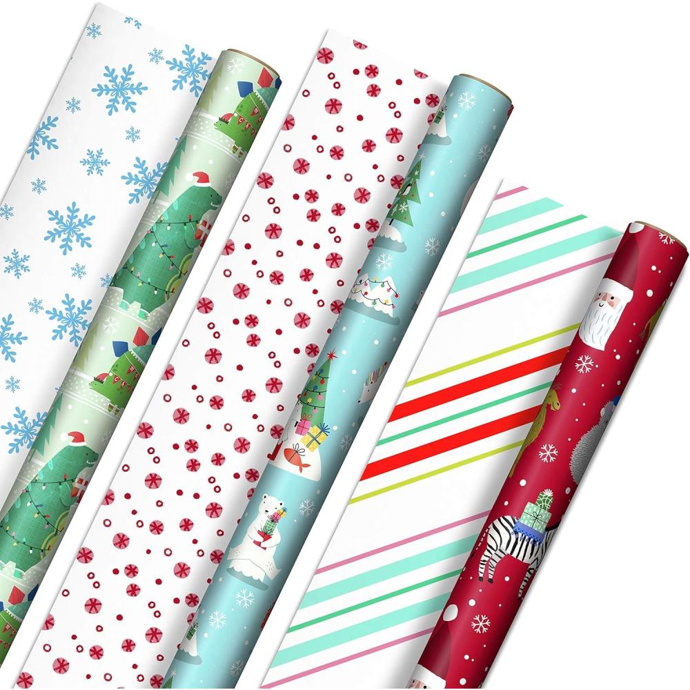 imageHallmark Trendy Reversible Christmas Wrapping Paper for Kids 3 Rolls 120 sq ft ttl Dinosaurs Koalas Polar Bears Penguins Camels Zebras StripesDinosaurs  Koalas  Polar Bears  Penguins  Camels  Zebras  Stripes