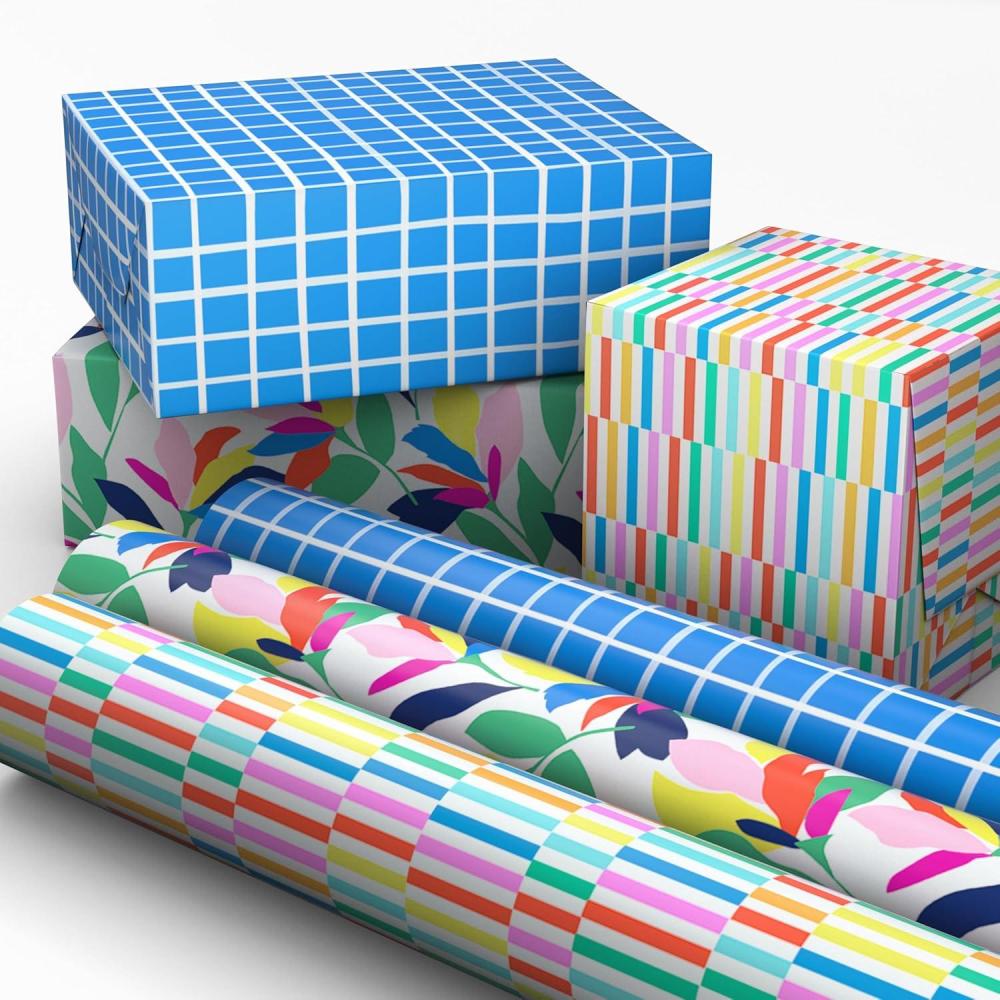 imageHallmark Wrapping Paper Mini Rolls 3Pack Blue Plaid Spring Flowers Rainbow Stripes for Birthdays Baby Showers Mothers Day Any Occasion  45 Sq Ft TotalBlue Plaid  Spring Flowers  Rainbow Stripes