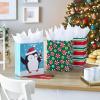 Hallmark Image Arts 11″ Large Christmas Gift Bags (6 Bags Penguins, Stripes, Peppermints) for Kids, Coworkers, Teachers
