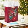 Hallmark Signature 10″ Square Christmas Gift Bag with Tissue Paper (Emerald Green with Poinsettias, Gold Merry Christmas) for Wife, Girlfriend, Mother, Daughter, Grandma, Teacher, Boss, Coworker(Dark Red with Poinsettias)