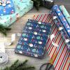 Hallmark Trendy Reversible Christmas Wrapping Paper for Kids (3 Rolls: 120 sq. ft. ttl) Dinosaurs, Koalas, Polar Bears, Penguins, Camels, Zebras, Stripes(Snowmen  Stripes  Trees  Skiing Santa  Zebras  Hedgehogs  Penguins)