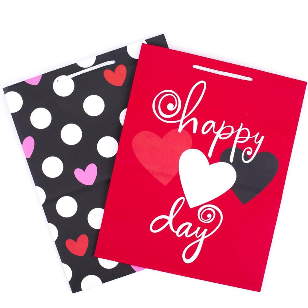 imageHallmark 9quot Medium Valentines Day Gift Bag with Tissue Paper Pink and Red Heart GridDots on Black  Happy Heart Day